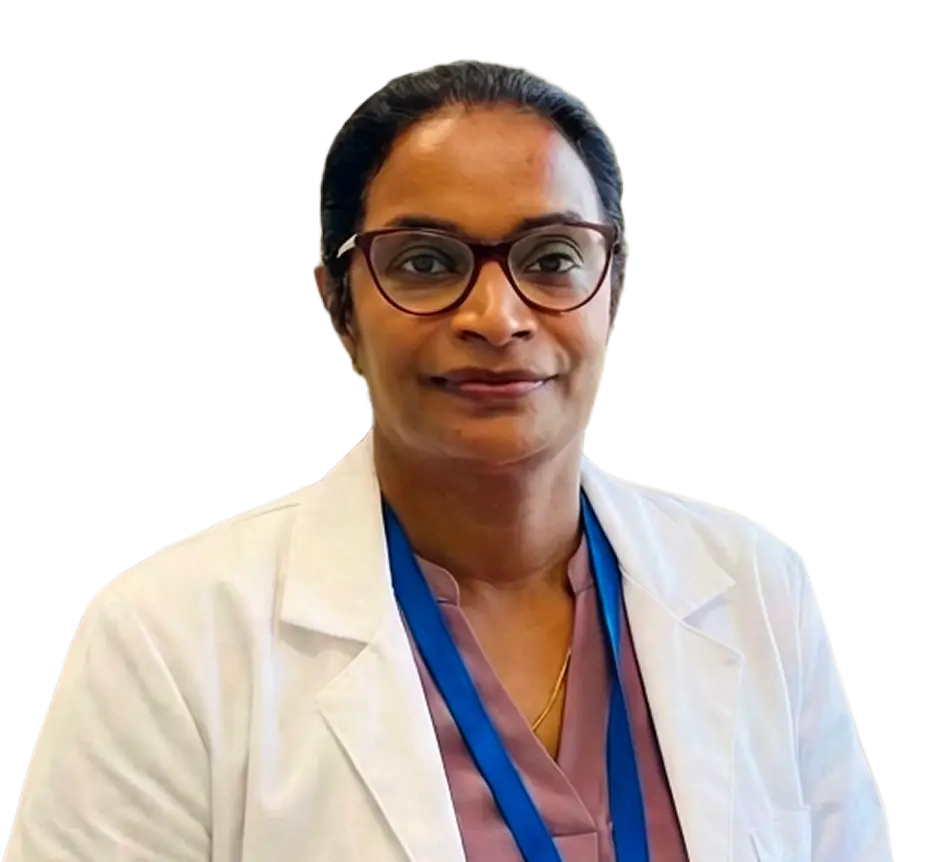 A woman wearing a lab coat and glasses, standing in a laboratory setting, focused on her work.