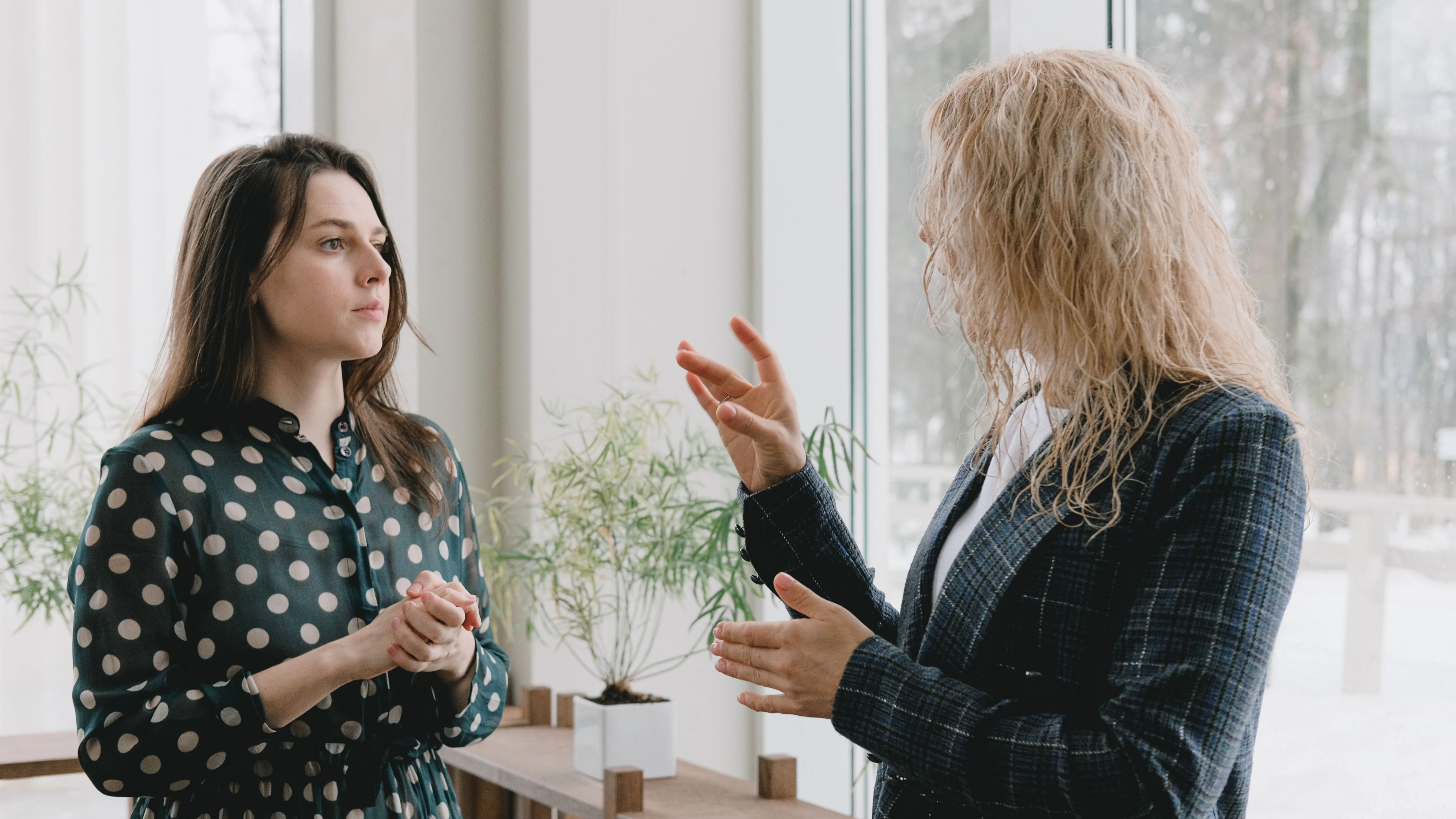 A patient discussing menopause symptoms with a licensed clinician during a consultation.